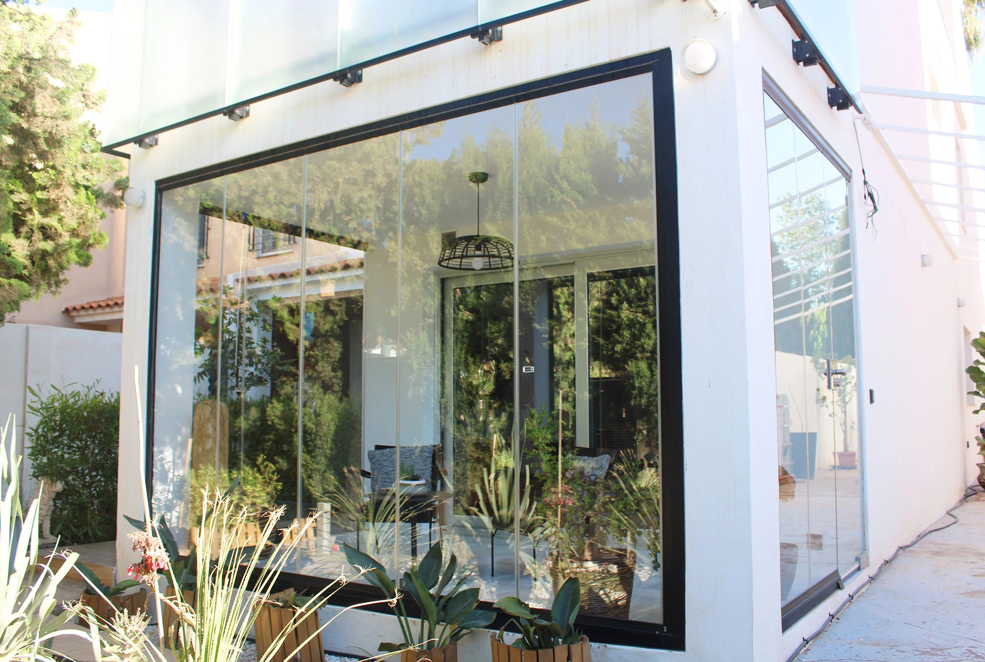 sistema pivot de cerramiento de cristal